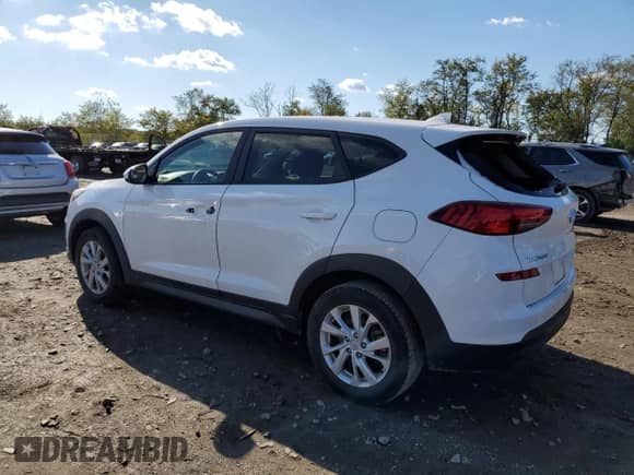 2019 Hyundai Tucson SE z VIN KM8J23A45KU869928, wystawiony jako Copart lot #87183485 z przebiegiem 42 648 mil mil oraz Szkoda całkowita • Salvage title. Historia ofert i sprzedaży dostępna na DreamBid. Obrazek 2.