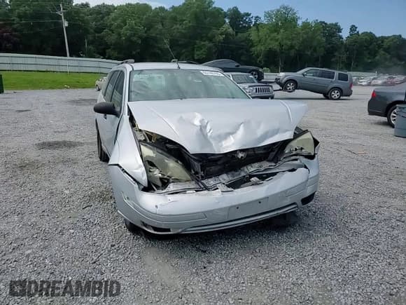 ✅ 2005 Ford Focus SE • VIN: 1FAFP36NX5W286167 • Lot: 65746765. Listed on Copart with 73,460 mi. Free auction sales archive from the USA and detailed vehicle history report at DreamBid. Image 13.