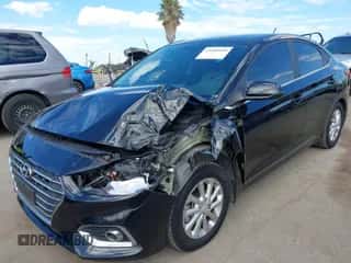 2022 Hyundai Accent SE with VIN 3KPC24A65NE166028, listed as a IAAI auction lot 43289568 with 61,170 mi miles and . Bid and sale history available at DreamBid. Image 6.