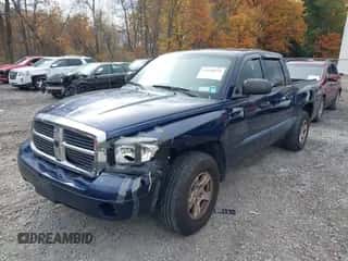 2006 Dodge Dakota SLT z VIN 1D7HW48N16S508036, wystawiony jako IAAI lot #43520375 z przebiegiem 168 810 mil mil oraz . Historia ofert i sprzedaży dostępna na DreamBid. Obrazek 6.