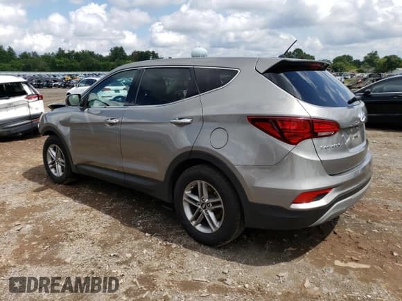 ✅ 2018 Hyundai Santa Fe 2.4L • VIN: 5XYZT3LBXJG545499 • Лот: 63765843. Опубликован ранее на Copart с пробегом 114 903 миль. Бесплатный доступ к архиву аукционных продаж из США и подробный отчёт об истории автомобиля на DreamBid. Изображение 2.