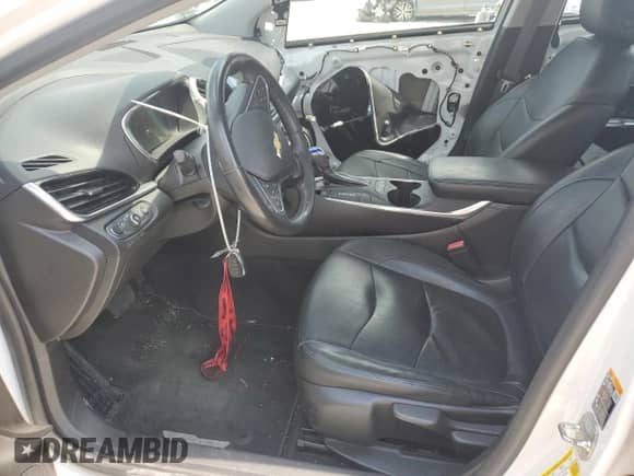 2017 Chevrolet Volt Premier z VIN 1G1RB6S56HU202562, wystawiony jako Copart lot #61245593 z przebiegiem 122 347 mil mil oraz . Historia ofert i sprzedaży dostępna na DreamBid. Obrazek 7.