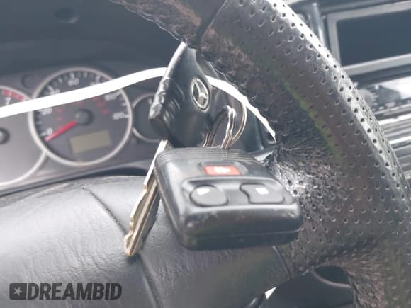 ✅ 2005 Mazda Tribute i • VIN: 4F2YZ92Z75KM42150 • Lot: 42703391. Listed on IAAI with 187,595 mi. Free auction sales archive from the USA and detailed vehicle history report at DreamBid. Image 11.