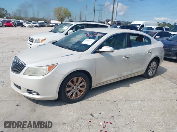 ✅ 2013 Buick LaCrosse Leather • VIN: 1G4GC5ERXDF257286 • Lot: 41682197. Listed on IAAI with 196,015 mi. Free auction sales archive from the USA and detailed vehicle history report at DreamBid. Image 18.
