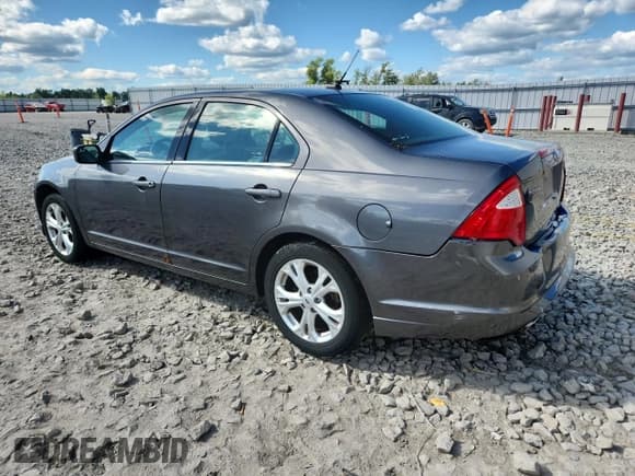 ✅ 2012 Ford Fusion SE • VIN: 3FAHP0HG4CR380325 • Лот: 70033005. Опубликован ранее на Copart с пробегом 122 769 миль. Бесплатный доступ к архиву аукционных продаж из США и подробный отчёт об истории автомобиля на DreamBid. Изображение 2.