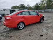 ✅ 2014 Ford Fiesta Titanium • VIN: 3FADP4CJ6EM171340 • Lot: 82093165. Listed on Copart with 104,005 mi. Free auction sales archive from the USA and detailed vehicle history report at DreamBid. Image 3.