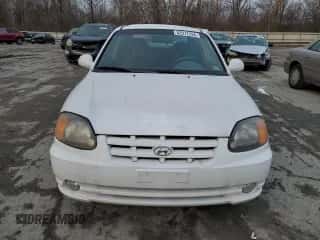 2003 Hyundai Accent GL with VIN KMHCG35C53U258469, listed as a Copart auction lot 82977294 with 99,136 mi miles and Clean title. Bid and sale history available at DreamBid. Image 5.