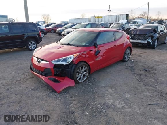 ✅ 2016 Hyundai Veloster • VIN: KMHTC6AD5GU268369 • Lot: 41235777. Listed on IAAI with 141,825 mi. Free auction sales archive from the USA and detailed vehicle history report at DreamBid. Image 2.