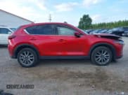✅ 2021 Mazda CX-5 Grand Touring • VIN: JM3KFBDM7M0357057 • Лот: 43110761. Опубликован ранее на IAAI с пробегом 66 576 миль. Бесплатный доступ к архиву аукционных продаж из США и подробный отчёт об истории автомобиля на DreamBid. Изображение 13.