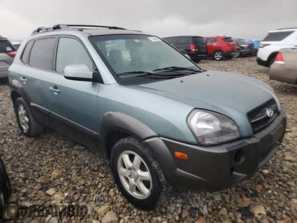 2005 Hyundai Tucson GLS z VIN KM8JN72DX5U214908, wystawiony jako Copart lot #76346024 z przebiegiem 152 677 mil mil oraz Szkoda całkowita • Salvage title. Historia ofert i sprzedaży dostępna na DreamBid. Obrazek 4.