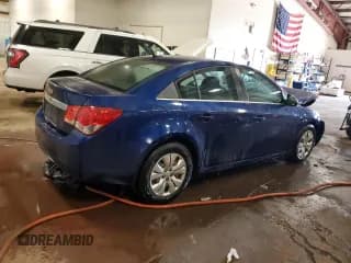 ✅ 2012 Chevrolet Cruze LS • VIN: 1G1PD5SH2C7285405 • Lot: 85330005. Listed on Copart with 169,263 mi. Free auction sales archive from the USA and detailed vehicle history report at DreamBid. Image 3.