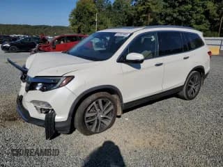 ✅ 2016 Honda Pilot Elite • VIN: 5FNYF6H0XGB064034 • Lot: 82361685. Wystawiony na Copart z przebiegiem 121 087 mil. Bezpłatny archiwum sprzedaży aukcyjnych z USA i szczegółowy raport historii pojazdu na DreamBid. Zdjęcie 1.