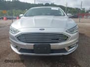 ✅ 2017 Ford Fusion Hybrid Titanium • VIN: 3FA6P0RU3HR188204 • Лот: 42618604. Опубликован ранее на IAAI с пробегом 104 609 миль. Бесплатный доступ к архиву аукционных продаж из США и подробный отчёт об истории автомобиля на DreamBid. Изображение 12.
