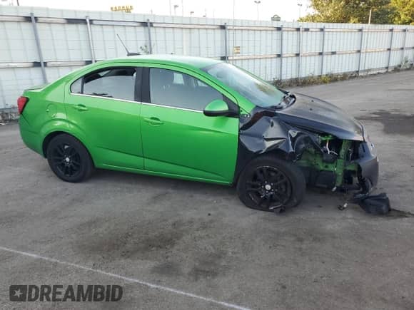 2015 Chevrolet Sonic LT с VIN 1G1JC5SH4F4163398, выставлен на аукционе Copart как лот 71773444 с пробегом 121 909 миль миль и Списание • Salvage title. История ставок и продаж доступна на DreamBid. Изображение 4.