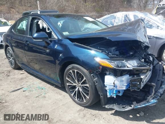 2020 Toyota Camry SE with VIN 4T1G11BKXLU002444, listed as a IAAI auction lot 41948501 with 53,902 mi miles and . Bid and sale history available at DreamBid. Image 1.