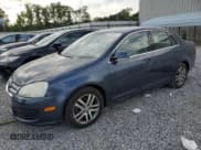 ✅ 2005 Volkswagen Jetta 2.5L • VIN: 3VWDG71K65M606300 • Lot: 57848515. Listed on Copart with 108,928 mi. Free auction sales archive from the USA and detailed vehicle history report at DreamBid. Image 1.