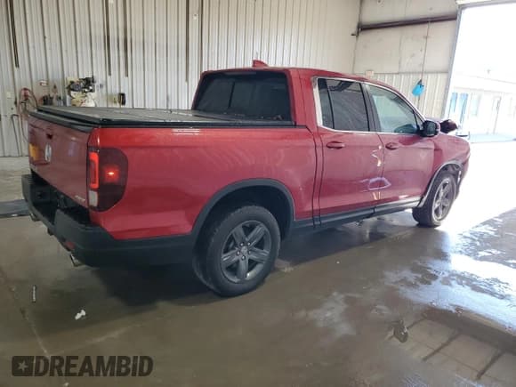 ✅ 2023 Honda Ridgeline RTL • VIN: 5FPYK3F51PB067128 • Lot: 86238605. Listed on Copart with 42,784 mi. Free auction sales archive from the USA and detailed vehicle history report at DreamBid. Image 3.
