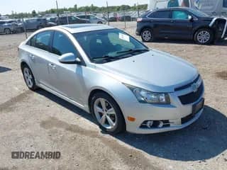2014 Chevrolet Cruze 2LT with VIN 1G1PE5SB6E7110800, listed as a IAAI auction lot 43221056 with 77,100 mi miles and . Bid and sale history available at DreamBid. Image 1.