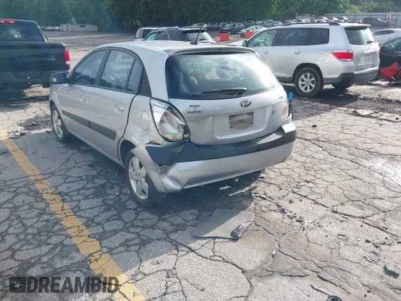 ✅ 2009 Kia Rio LX • VIN: KNADE243X96580822 • Lot: 42298525. Wystawiony na IAAI z przebiegiem 157 013 mil. Bezpłatny archiwum sprzedaży aukcyjnych z USA i szczegółowy raport historii pojazdu na DreamBid. Zdjęcie 3.