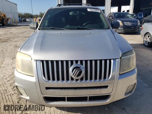 ✅ 2011 Mercury Mariner • VIN: 4M2CN9BG0BKJ00565 • Lot: 75045024. Listed on Copart with 125,735 mi. Free auction sales archive from the USA and detailed vehicle history report at DreamBid. Image 5.