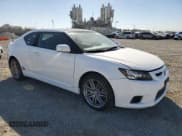 ✅ 2011 Scion tC • VIN: JTKJF5C73B3011755 • Lot: 82583495. Listed on Copart with 94,048 mi. Free auction sales archive from the USA and detailed vehicle history report at DreamBid. Image 4.