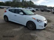 ✅ 2014 Hyundai Veloster • VIN: KMHTC6ADXEU214255 • Lot: 86828824. Wystawiony na Copart z przebiegiem 144 731 mil. Bezpłatny archiwum sprzedaży aukcyjnych z USA i szczegółowy raport historii pojazdu na DreamBid. Zdjęcie 4.