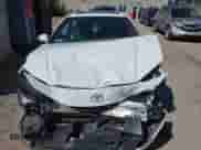 2025 Toyota Camry LE with VIN 4T1DAACK2SU046289, listed as a IAAI auction lot 43340143 with 5,363 mi miles and . Bid and sale history available at DreamBid. Image 12.