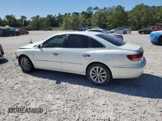 2006 Hyundai Azera SE z VIN KMHFC46F76A112099, wystawiony jako Copart lot #76604094 z przebiegiem Nie podano mil oraz Szkoda całkowita • Salvage title. Historia ofert i sprzedaży dostępna na DreamBid. Obrazek 2.