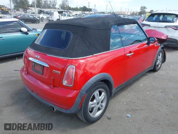 ✅ 2007 MINI Convertible • VIN: WMWRF335X7TG16764 • Lot: 42258381. Listed on IAAI with 129,416 mi. Free auction sales archive from the USA and detailed vehicle history report at DreamBid. Image 4.