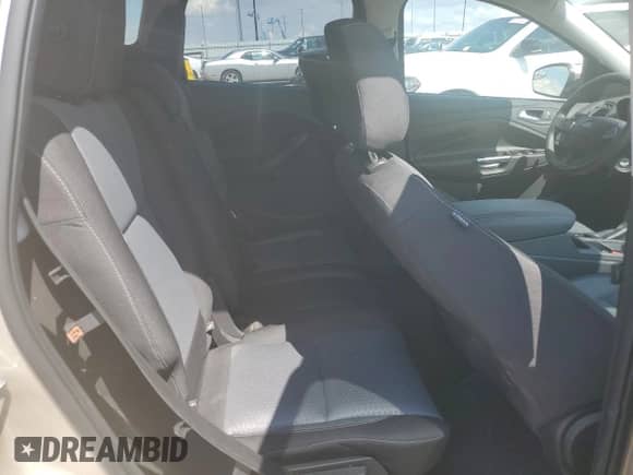 2018 Ford Escape SE z VIN 1FMCU9GD8JUB25767, wystawiony jako Copart lot #58503335 z przebiegiem 56 352 mil mil oraz Szkoda całkowita • Salvage title. Historia ofert i sprzedaży dostępna na DreamBid. Obrazek 11.