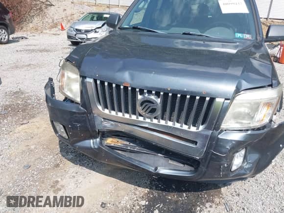 2010 Mercury Mariner z VIN 4M2CN8B79AKJ28843, wystawiony jako IAAI lot #40099437 z przebiegiem 203 467 mil mil oraz . Historia ofert i sprzedaży dostępna na DreamBid. Obrazek 6.