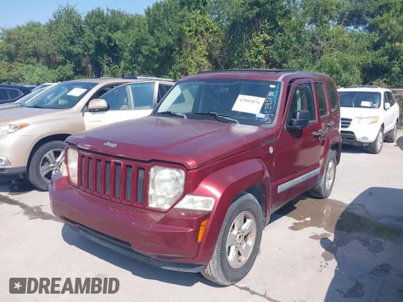 ✅ 2009 Jeep Liberty Rocky Mountain • VIN: 1J8GN28KX9W524373 • Lot: 42902076. Listed on IAAI with 197,260 mi. Free auction sales archive from the USA and detailed vehicle history report at DreamBid. Image 2.