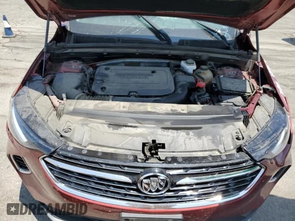 ✅ 2023 Buick Envision Essence • VIN: LRBFZNR4XPD061716 • Lot: 62034995. Listed on Copart with 59,328 mi. Free auction sales archive from the USA and detailed vehicle history report at DreamBid. Image 12.