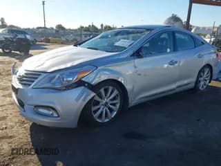 ✅ 2013 Hyundai Azera • VIN: KMHFH4JGXDA203110 • Лот: 41813088. Опубликован ранее на IAAI с пробегом 104 854 миль. Бесплатный доступ к архиву аукционных продаж из США и подробный отчёт об истории автомобиля на DreamBid. Изображение 2.