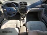 ✅ 2006 Kia Spectra EX • VIN: KNAFE121565254190 • Lot: 64721574. Wystawiony na Copart z przebiegiem 208 367 mil. Bezpłatny archiwum sprzedaży aukcyjnych z USA i szczegółowy raport historii pojazdu na DreamBid. Zdjęcie 8.