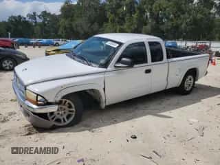 2003 Dodge Dakota SLT z VIN 1D7HL42XX3S333865, wystawiony jako Copart lot #73509404 z przebiegiem 123 515 mil mil oraz Szkoda całkowita • Salvage title. Historia ofert i sprzedaży dostępna na DreamBid. Obrazek 1.
