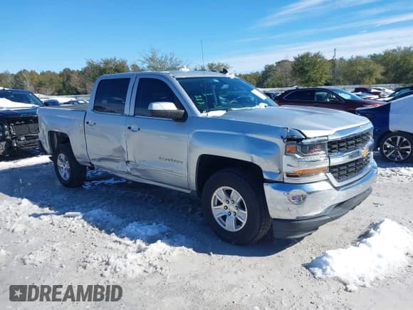 ✅ 2018 Chevrolet Silverado 1500 LT • VIN: 3GCPCREH6JG359777 • Лот: 41377806. Опубликован ранее на IAAI с пробегом 133 611 миль. Бесплатный доступ к архиву аукционных продаж из США и подробный отчёт об истории автомобиля на DreamBid. Изображение 1.