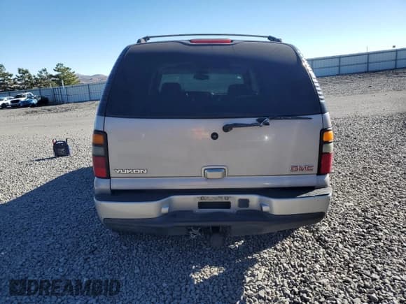 ✅ 2005 GMC Yukon Denali • VIN: 1GKEK63U45J124263 • Lot: 90482235. Wystawiony na Copart z przebiegiem 292 442 mil. Bezpłatny archiwum sprzedaży aukcyjnych z USA i szczegółowy raport historii pojazdu na DreamBid. Zdjęcie 6.