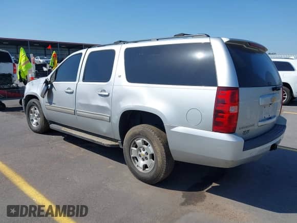 2014 Chevrolet Suburban LT z VIN 1GNSCJE0XER124222, wystawiony jako IAAI lot #41994798 z przebiegiem 268 836 mil mil oraz . Historia ofert i sprzedaży dostępna na DreamBid. Obrazek 3.