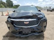 ✅ 2024 Cadillac XT4 AWD Premium Luxury • VIN: 1GYFZDR45RF222258 • Lot: 61138515. Wystawiony na Copart z przebiegiem 10 021 mil. Bezpłatny archiwum sprzedaży aukcyjnych z USA i szczegółowy raport historii pojazdu na DreamBid. Zdjęcie 5.