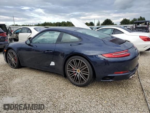 ✅ 2017 Porsche 911 Carrera S • VIN: WP0AB2A93HS123587 • Лот: 74075574. Опубликован ранее на Copart с пробегом Не указан. Бесплатный доступ к архиву аукционных продаж из США и подробный отчёт об истории автомобиля на DreamBid. Изображение 2.