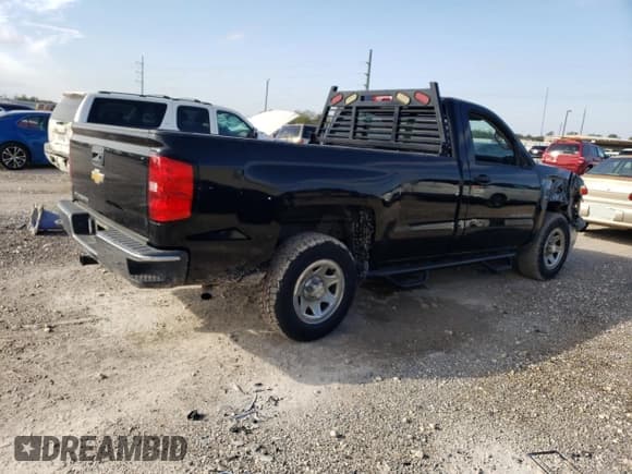 ✅ 2015 Chevrolet Silverado 1500 LS • VIN: 1GCNCPEH7FZ191408 • Лот: 79338534. Опубликован ранее на Copart с пробегом 125 022 миль. Бесплатный доступ к архиву аукционных продаж из США и подробный отчёт об истории автомобиля на DreamBid. Изображение 3.