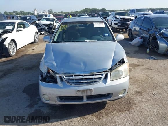 ✅ 2005 Kia Spectra LX • VIN: KNAFE121955143141 • Lot: 42767872. Listed on IAAI with 178,724 mi. Free auction sales archive from the USA and detailed vehicle history report at DreamBid. Image 12.