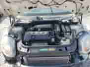 2009 MINI Hardtop with VIN WMWMF33539TT69081, listed as a Copart auction lot 58087205 with 106,470 mi miles and Salvage title. Bid and sale history available at DreamBid. Image 11.