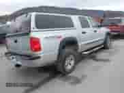 2009 Dodge Dakota z VIN 1D3HW78P99S805984, wystawiony jako IAAI lot #41798436 z przebiegiem 76 880 mil mil oraz . Historia ofert i sprzedaży dostępna na DreamBid. Obrazek 4.