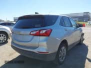 ✅ 2021 Chevrolet Equinox LS • VIN: 3GNAXHEV1MS108880 • Lot: 43571000. Listed on IAAI with 157,117 mi. Free auction sales archive from the USA and detailed vehicle history report at DreamBid. Image 4.