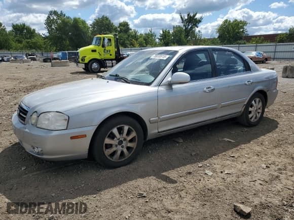 ✅ 2005 Kia Optima LX • VIN: KNAGD128655427167 • Lot: 70038915. Listed on Copart with 174,958 mi. Free auction sales archive from the USA and detailed vehicle history report at DreamBid. Image 1.