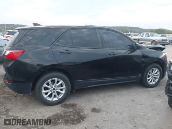 ✅ 2018 Chevrolet Equinox LT • VIN: 2GNAXJEV3J6186031 • Lot: 43453122. Listed on IAAI with 124,392 mi. Free auction sales archive from the USA and detailed vehicle history report at DreamBid. Image 13.