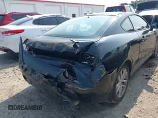 2008 Hyundai Tiburon GS с VIN KMHHM66D08U291751, выставлен на аукционе IAAI как лот 42399668 с пробегом 161 156 миль миль и . История ставок и продаж доступна на DreamBid. Изображение 6.