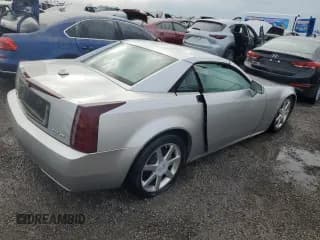 ✅ 2004 Cadillac XLR • VIN: 1G6YV34A545602056 • Lot: 66506514. Wystawiony na Copart z przebiegiem Nie podano. Bezpłatny archiwum sprzedaży aukcyjnych z USA i szczegółowy raport historii pojazdu na DreamBid. Zdjęcie 3.